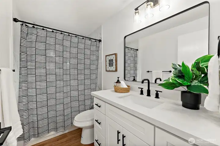 Shared bath - updated fixtures and tiled shower