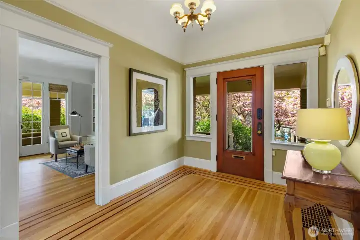 Original hardwood floor with mahogany inlays are featured throughout the first floor.