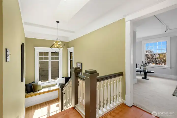 Spacious landing with newly finished fir floors outside of four bedrooms.