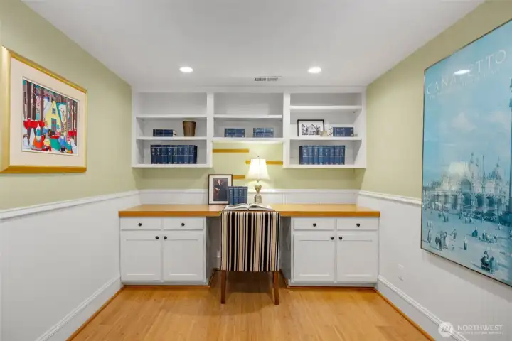 For working at home, a private office with built-in desk and bookcase.