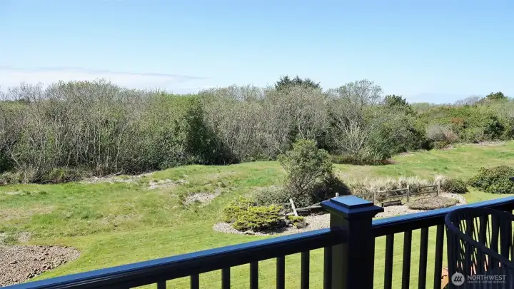 View from #202's Deck.  View of the Dunes and peak-a-book views of the Ocean.