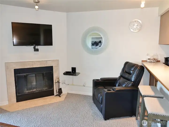 Presto-log Fireplace with a big comfy chair.