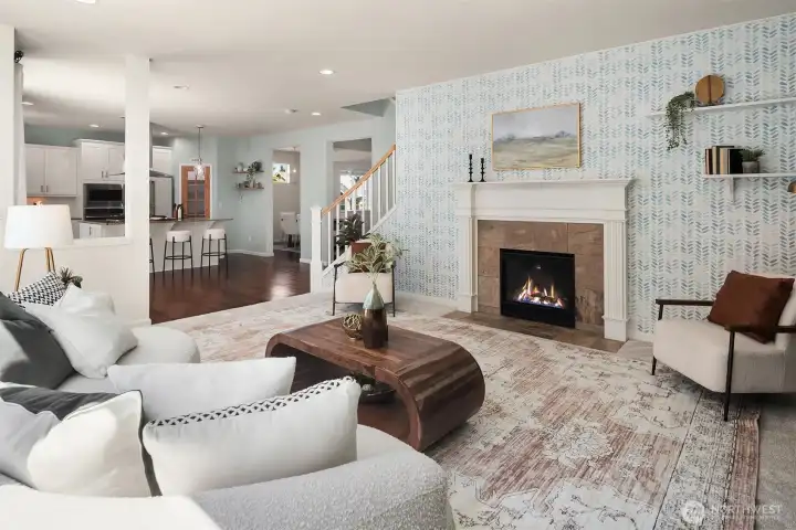 Family room with a  gas fireplace for a cozy evening.