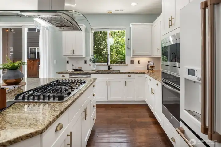 Six burner stove with beautiful flooring.