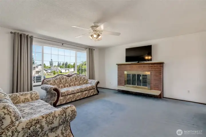 Ceiling fan too cool, and fireplace to warm you up in the winter.