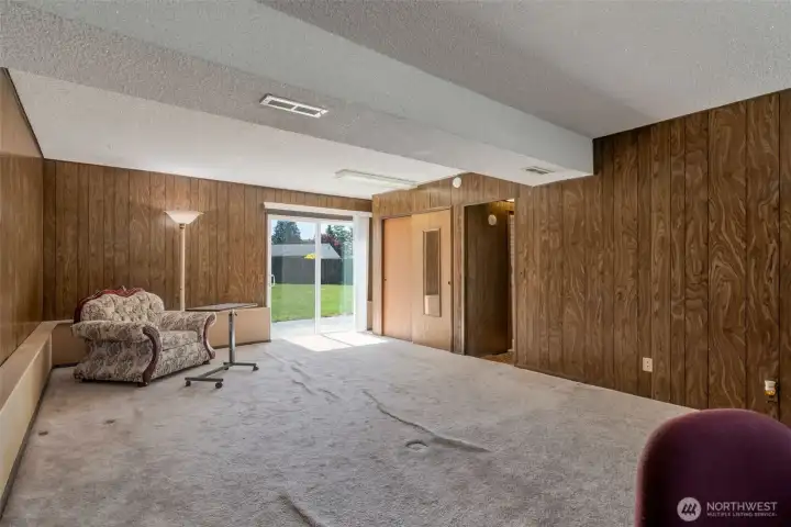 Huge downstairs area leads out to fully fenced back yard.