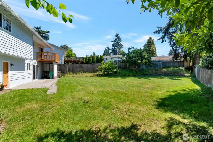 Huge fully fenced back yard. Perfect for summer fun.