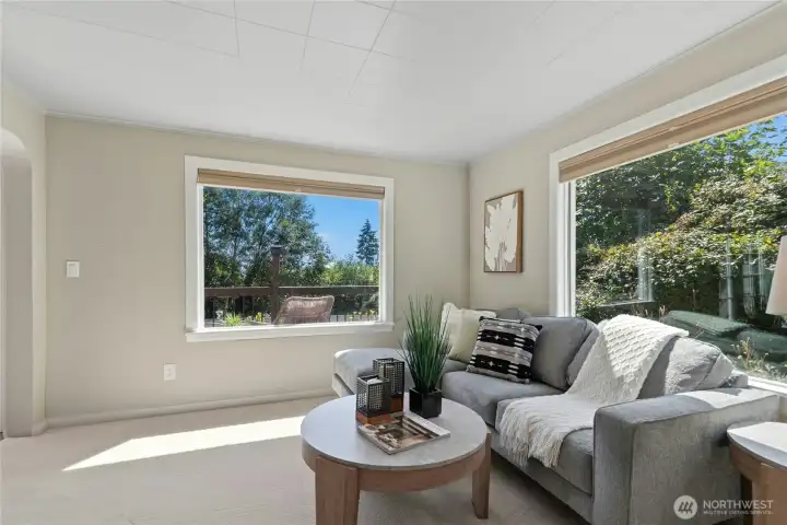 Main living area with 2 picture windows that maximize natural light into the home. Main living area with 2 picture windows that maximize natural light into the home.