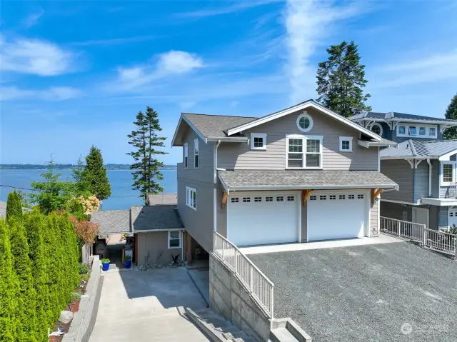 Street View, don't miss the Oversized One Car Garage on the lower level, just below the Attached Oversized Double Garage... TONS of Storage. Garages are Full Length and High Ceilings, large enough for Trucks and Boats.