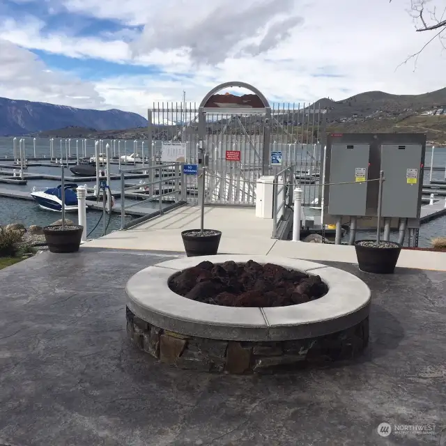 The cozy firepit may become your favorite place to relax besides your boat!