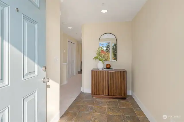 Generous entryway sets the tone for the bright and airy interiors.