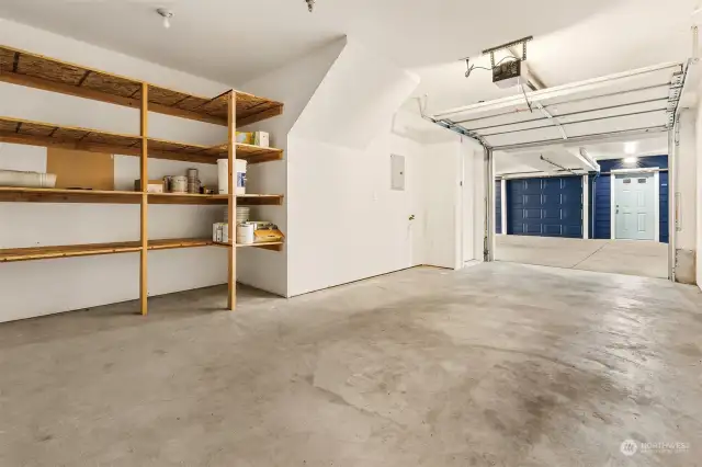 Generously portioned garage with additional shelving for your gear.