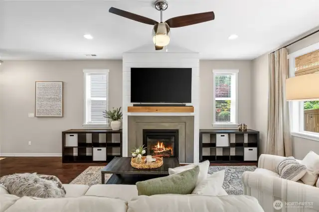 With its updated surround, the fireplace becomes a refined focal point—blending modern style seamlessly into the home’s classic design.
