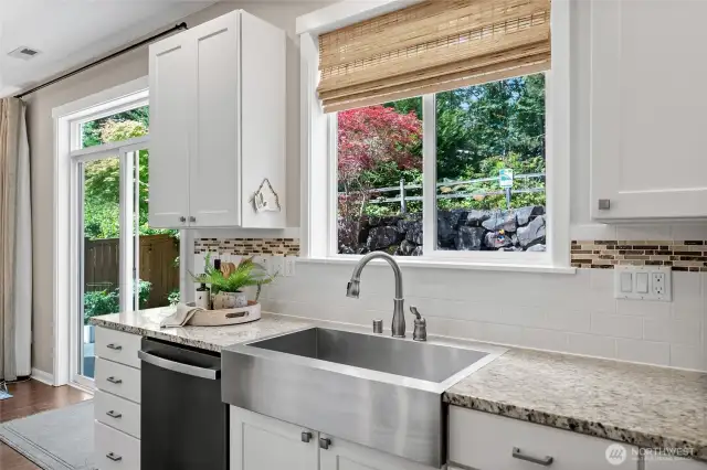 You’ll love the bamboo Roman shades and cordless blinds featured throughout the home, adding a stylish and polished look to the space.