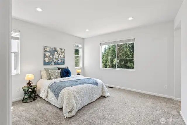 Primary Bedroom with Ensuite and walk-in Closet - Located on Upper Level
