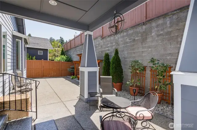 Very private easy care back yard. has expanded patio space and spacious covered porch area.