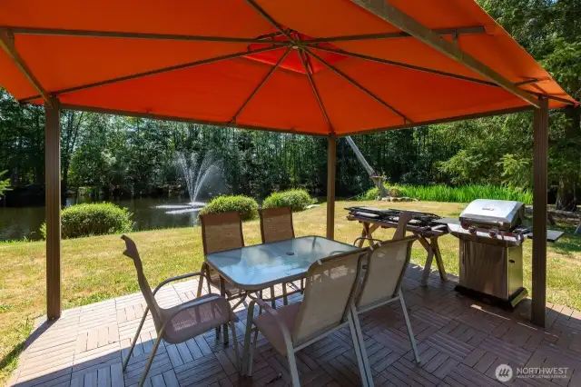 The gazebo overlooks pond. Great spot to relax, BBQ and entertain.