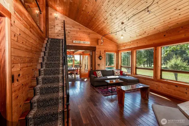 Great room. Stairs to primary bedroom on upper floor.