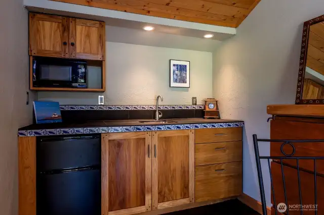 Kitchenette in guest studio. Custom build cabinetry.