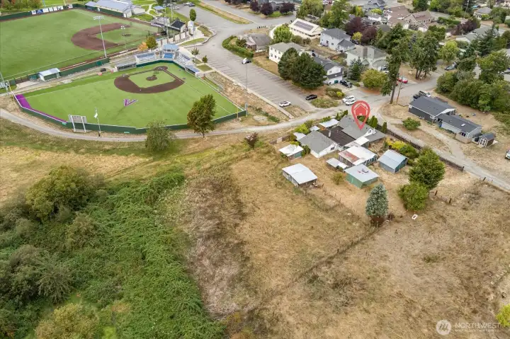 Location location location! Tucked into a quieter part of town, just near the ballfields and park, but close enough to town's many amenities! *not all structures are within property lot lines*