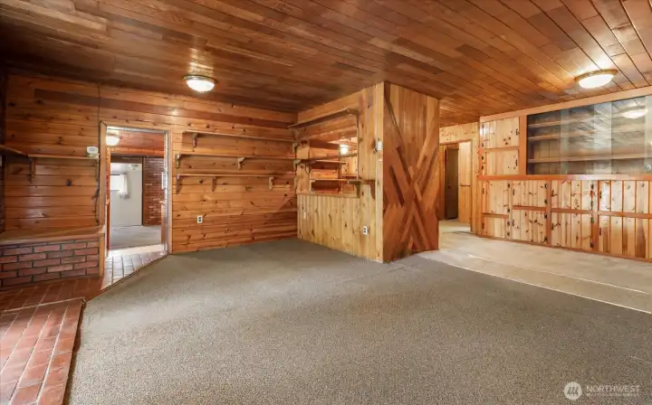 To the left is an entrance into the 1st kitchen... yes there are two! Around to the right accesses a bedroom, a bathroom, the upstairs rooms, and another entrance to the 1st kitchen.