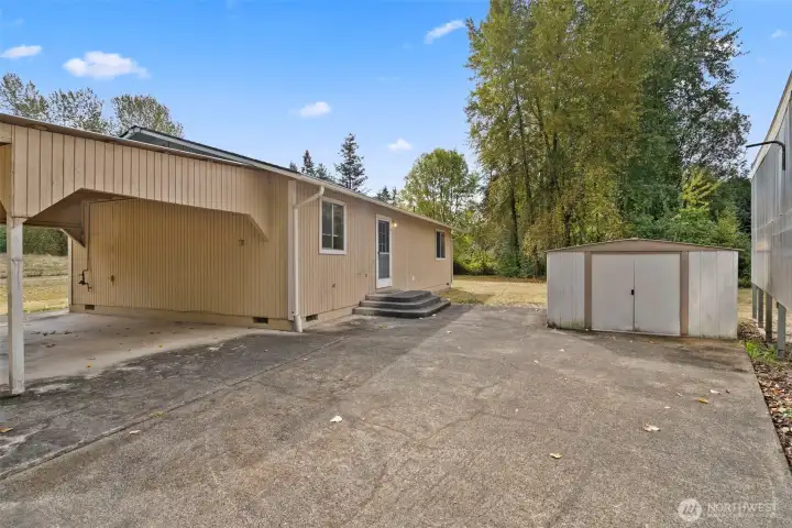 Patio view with storage shed