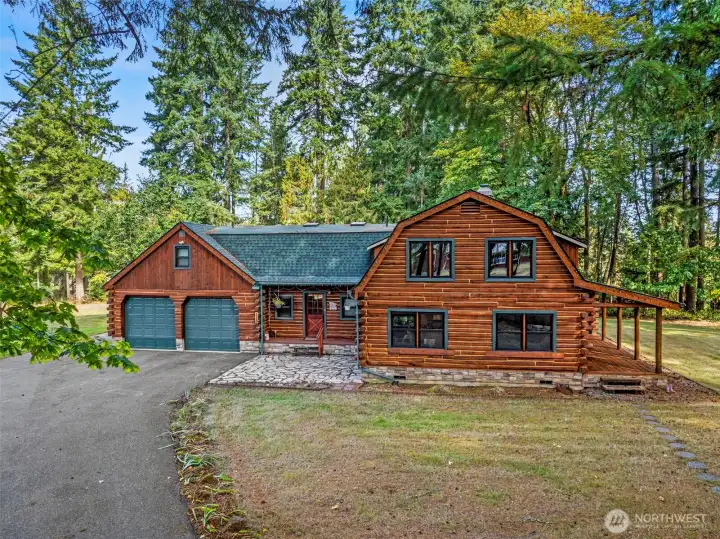 Front entrance with two car garage.