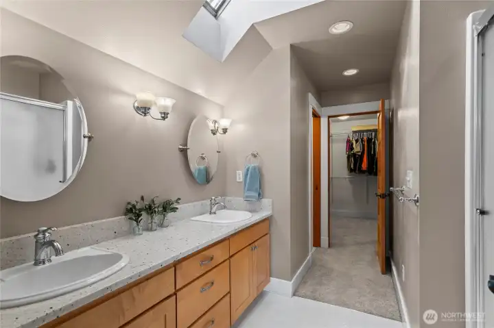 Primary bathroom with shower and skylight