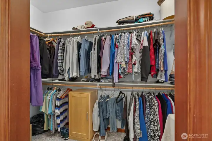 Walk-in closet in the primary suite.