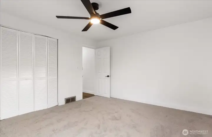 Bedroom 1 pictured with closet