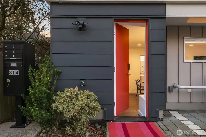 Entry floor Guest suite with wet bar + walk in closet.