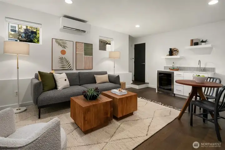 Entry floor Guest suite with wet bar + walk in closet.