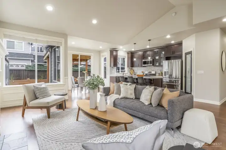 View of living space and open style kitchen
