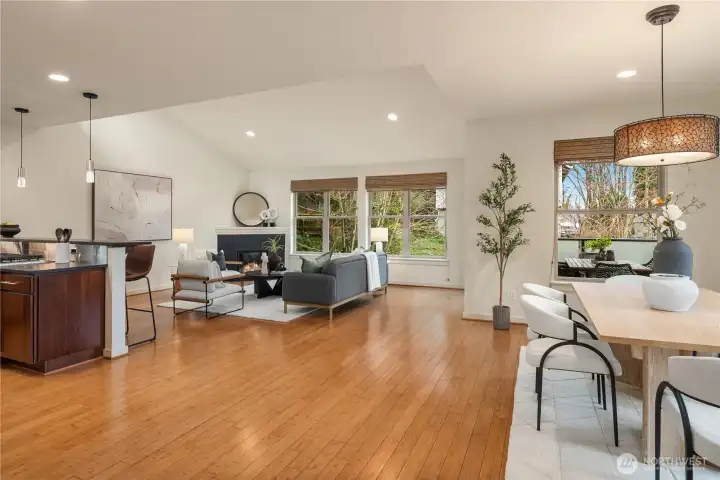 The main level features this true great room with soaring vaulted ceilings and a wonderfully versatile floorplan.
