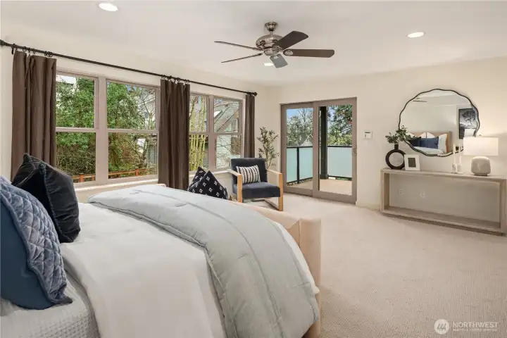 Just off the primary bedroom is a covered deck as well as a private bath and walk-in closet.