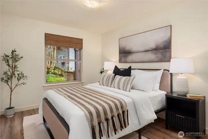 The fourth bedroom is located on the lower level with a nice outlook to the backyard.