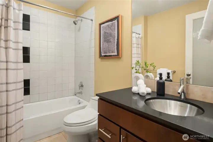 The fourth bathroom is located downstairs again with heated floors and wonderfully appointed.
