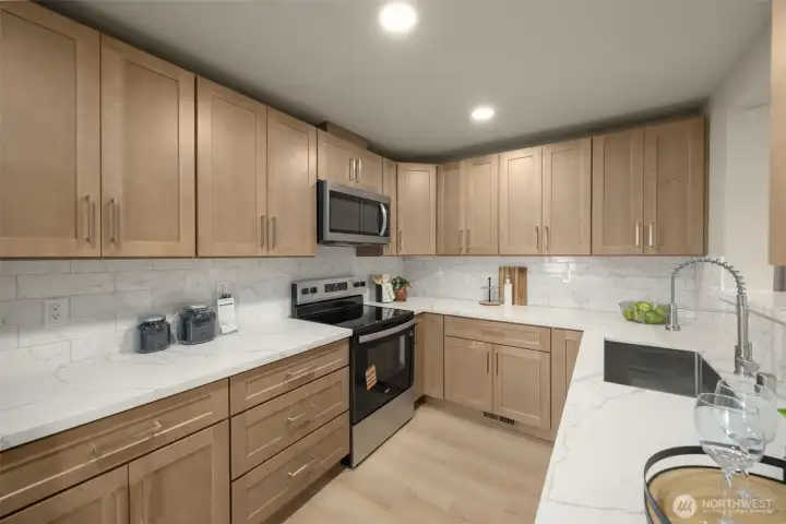 Quartz countertops. All appliances stay.