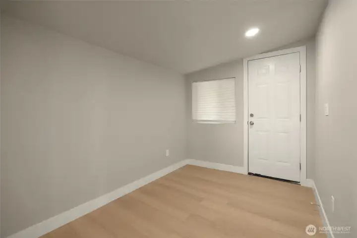 Unique office space around the dining corner. Door leads to side yard.