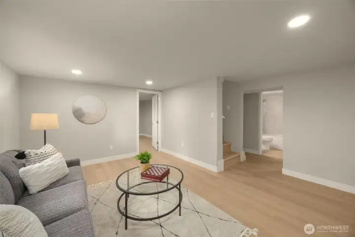 Versatile lower level for multi-gen living or rental income.