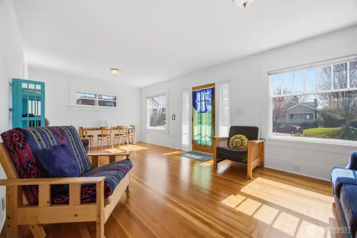 Looking across the spacious living and dining areas at the front of the home.