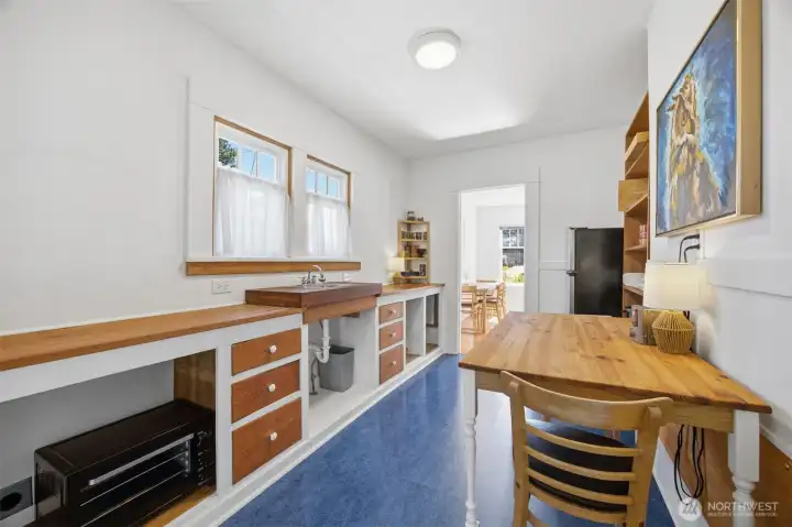 The kitchen also has plenty of room for a smaller dining table and chairs.