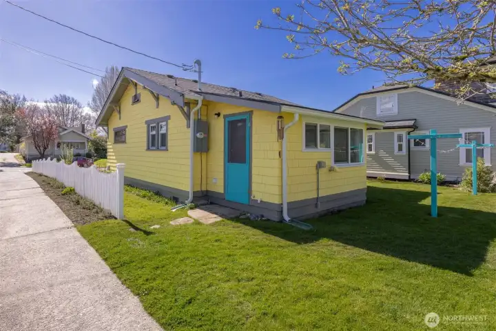 The back door opens into the utility room and has the new PSE power meter beside it.