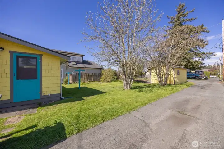 Another view of the rear yard and garage from the alley.