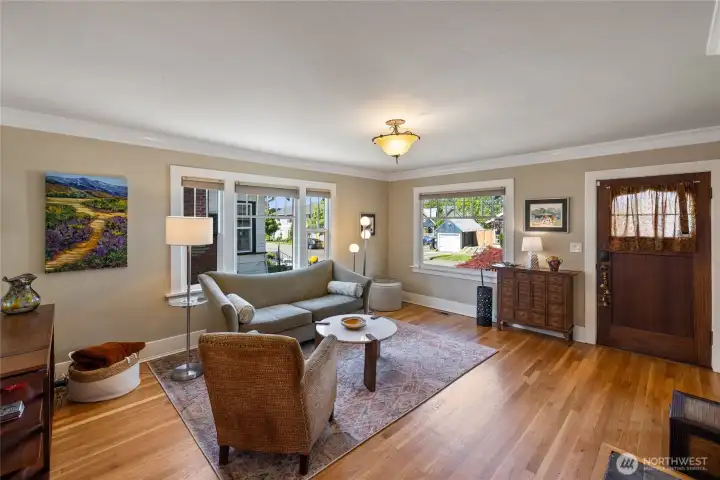 Large windows light up the living room.