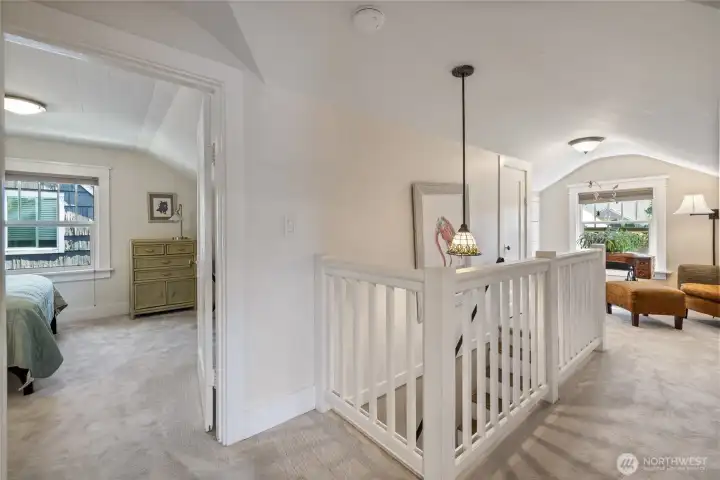 A cozy landing greets you upstairs.