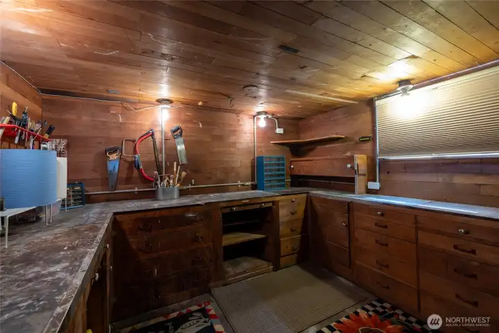 Workshop/canning room tucked in the basement.