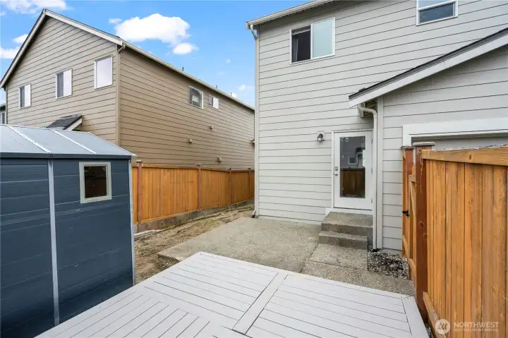 Enclosed back yard with storage shed Enclosed back yard with storage shed