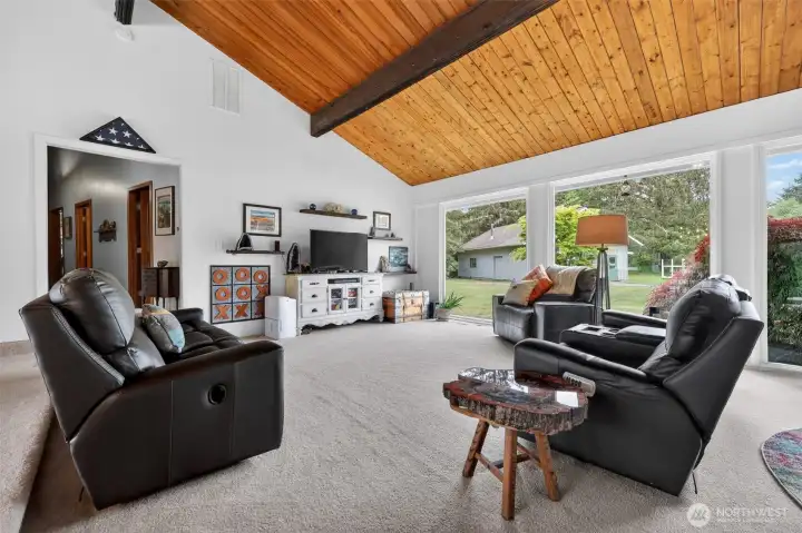 Spacious great room with dramatic vaulted ceiling