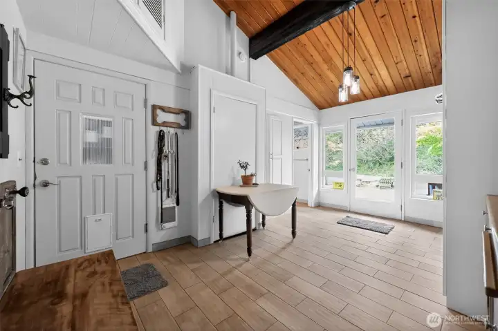 Utility room to the large exterior covered breezeway to the garage